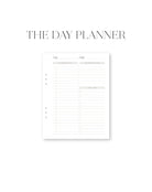 White planner with text 'THE DAY PLANNER' on a white background